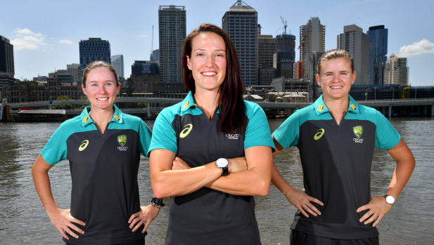 Australian women's cricket team mates  Beth Mooney, Megan Schutt (centre) and Jess Jonassen (right) at South Bank earlier this month.