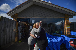 'She's an angel': Pensioner Anita gets a hug from Bk 2 Basics Melbourne founder Kelly Warren, right. 