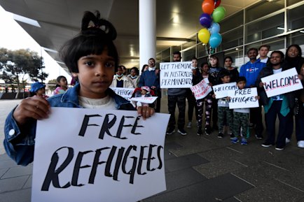 Supporters welcoming the Murugappan family at Perth Airport last week. 