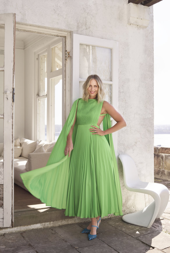 Sylvia wears Valentino dress and Fendi shoes.