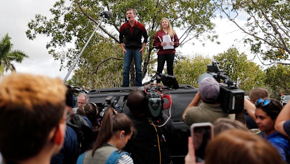 Student survivors Cameron Kasky and Jackie Corin from Marjory Stoneman Douglas High School mobilise students before travelling to a protest outside the state capitol. 