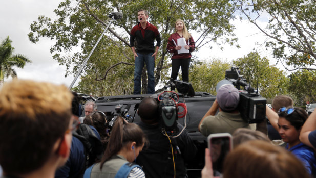 Student survivors Cameron Kasky and Jackie Corin from Marjory Stoneman Douglas High School mobilise students before travelling to a protest outside the state capitol. 