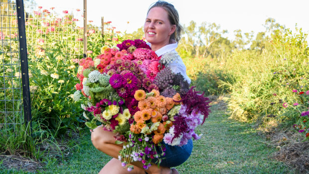 Mt Lawless Organic Flower Farm owner Natalie Harris with a selection of her blooms.