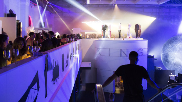 People attend the MAAS Fashion Ball at the Powerhouse Museum in February.