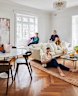 The living room is where Tash Sefton, Adam Genovese and Sefton’s sons Jay (in the bay window) and Mac like to hang out. The large artwork, Feelings Like This, is by Antonia Perricone.