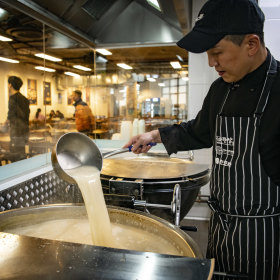 Head chef Sungjun Kim prepares the bone broth.