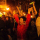 Local residents celebrate as Junius Ho Kwan-yiu loses in District Council Elections, outside a polling station in Hong Kong, 