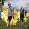 Residents collect sandbags from a council depot in Morningside.