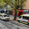 Ambulances parked outside the Royal Melbourne Hospital emergency department on Friday