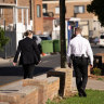 Detectives in Greenacre during the counter-terror raids.