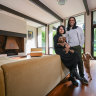 Onisha and Veeral Patel and their dogs Cipo and Hachi in their Robin Boyd designed home in Vermont. 