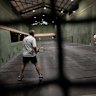 Players on the newly opened real tennis court at the Cheltenham Recreation Club in Sydney. 