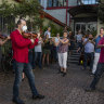 Members of the orchestra of Opera Australia performing with their instruments outside the offices of Opera Australia in March to call on the company to reconsider its decision to stand down musicians without pay. 