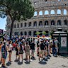 Tourists queue for water outside the Colosseum in Rome during a heatwave last summer.
