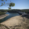 Sydney dams start to spill after a saturated six months