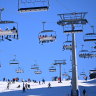 People enjoying a bright day on the slopes at Mount Buller.