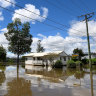 Floodwater lingers after 30 suburbs hit with more than 1 metre of rain