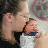 Mum Madeline Leahy with her baby girl Amelia, born 12 hours before International Women’s Day. 