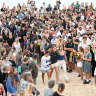Hundreds gathered on the beach to pay tribute to Charlize Zmuda.