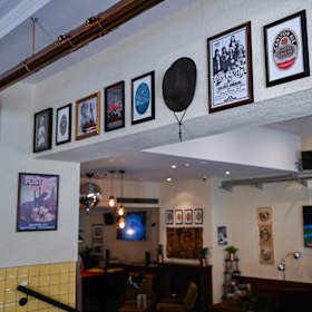 The Carlton Draught bar is decked out with archival posters and memorabilia.