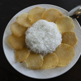 Steak tartare with parmigiano reggiano and potato chips