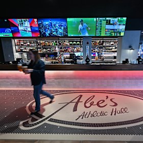 The sports bar has arcade games and private karaoke booths.