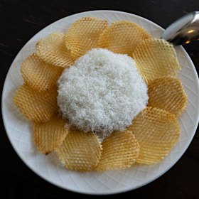 Steak tartare with parmigiano reggiano and potato chips