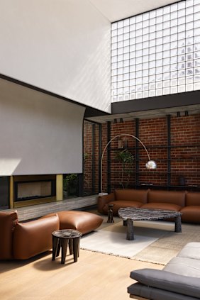 The light-filled extension has a double-height ceiling over the dining and living area.