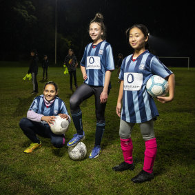 Under-12 footballers Samaira Bagga, Charlotte Keller and Casey Ahn.