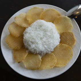 Steak tartare with parmigiano reggiano and potato chips