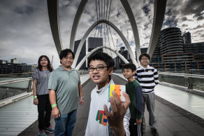 Globe-trotting with a cube: American Max Siaouw, 12, at South Wharf with his family.