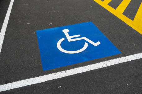 Disabled parking: the blue stickers are meant for people with a disability.