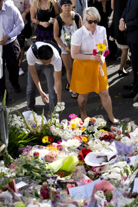 Flowers laid at a memorial service for Ms Ban in 2013.