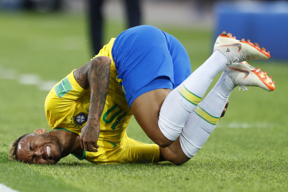 On a roll: Neymar feels the pain during the World Cup.