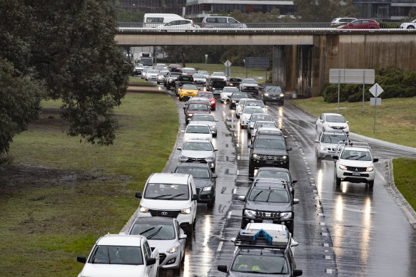 Heavy rain on Thursday morning slowed traffic on Parkes Way.
