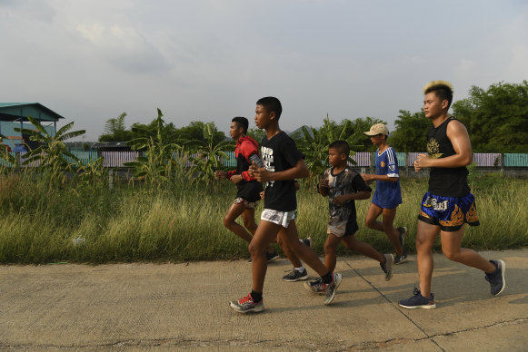 Samsun during his afternoon run with his fellow Muay Thai fighters.