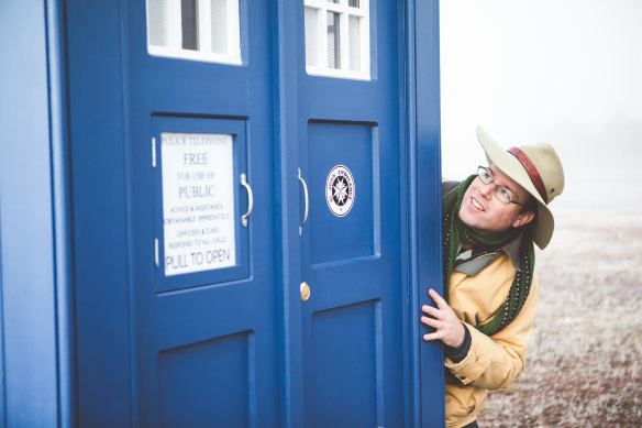 Tim inspects the TARDIS (Time and Relative Dimension in Space).