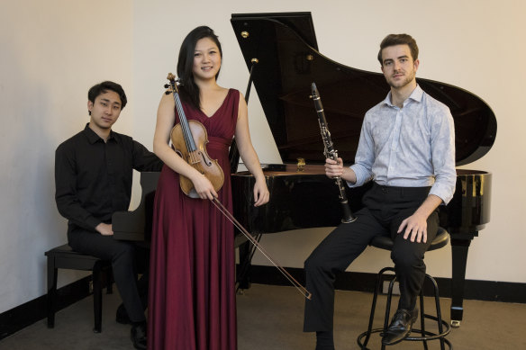 The young musicians with their instruments: Kevin Chow, Emily Sun and Oliver Shermacher.