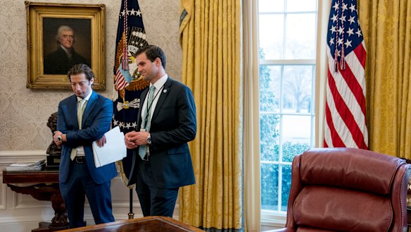 John McEntee, right, was frogmarched out of the White House on Tuesday.