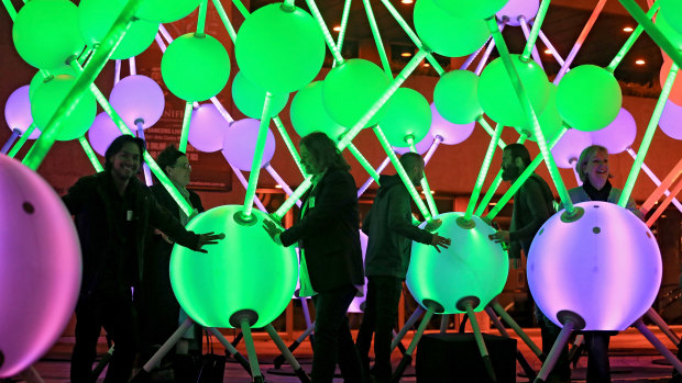 Affinity, a massive, interactive light sculpture representing neurons in the brain, is seen on the forecourt of the Arts Centre in Melbourne in 2015. The sculpture was commissioned by Alzheimer's Australia. 