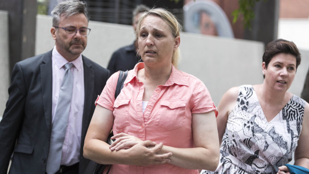 Linda Mason leaves the Brisbane Magistrates Court after the reopening of the inquest into the murder of her sister, 15-year-old Annette Jane Mason.