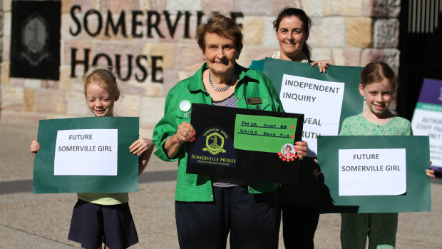 Isabel Bauer protests about the PMSA with daughter and granddaughters Alexandra and Emma.