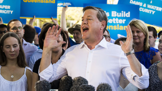 Opposition leader Tim Nicholls addresses supporters and media on Sunday.