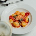 Ricotta gnocchi feature on Gran Torino's menu when tomatoes are at their sunny best.