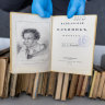 A university employee presents a fake copy of a first edition of the 1822 book ‘Kavkazskiy plennik: povest’ by Alexander Pushkin at the University of Warsaw library in Poland.