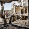 A man walks among the destruction after a more than 50-hour Israeli military operation in the northern West Bank’s Nur Shams refugee camp.