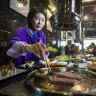 Jumee Lee cooks Korean BBQ for lunch at BBQ King on King street.