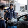 Arjun Mohan farewelled Malini V kerbside at the airport along with their dog Furphy, a practice which is set to be abolished. 