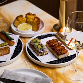 Pan tomate, gilda toast and anchovy churro.