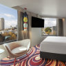 A King room at Adge Hotel + Residences.